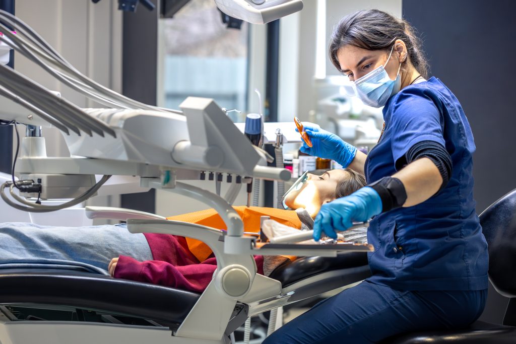 Young female Dentist at work